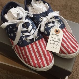 Red white and blue canvas sport shoes